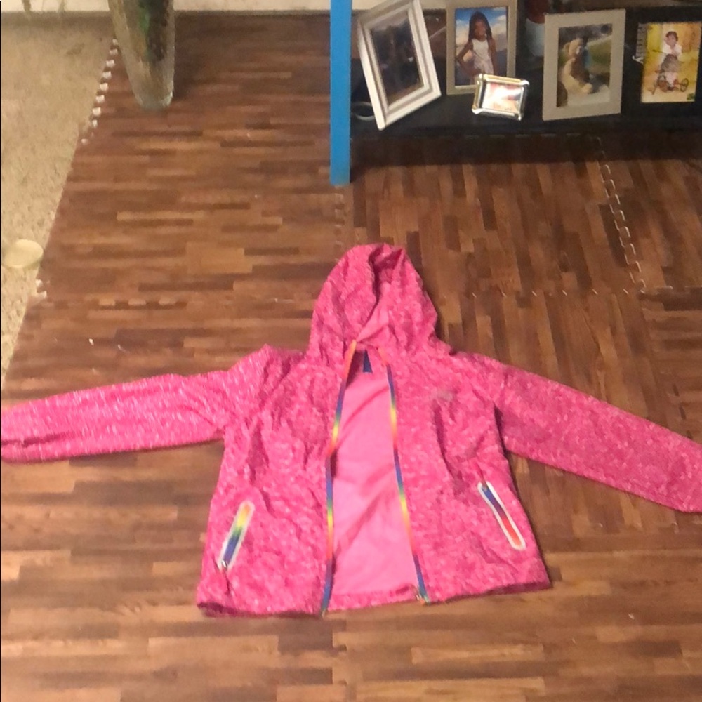 This is a colorful windbreaker in good condition